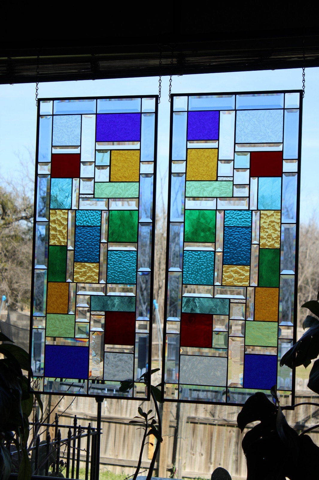 Stained Glass window pair, hanging panels each panel37.5×16.5 ” colored glass