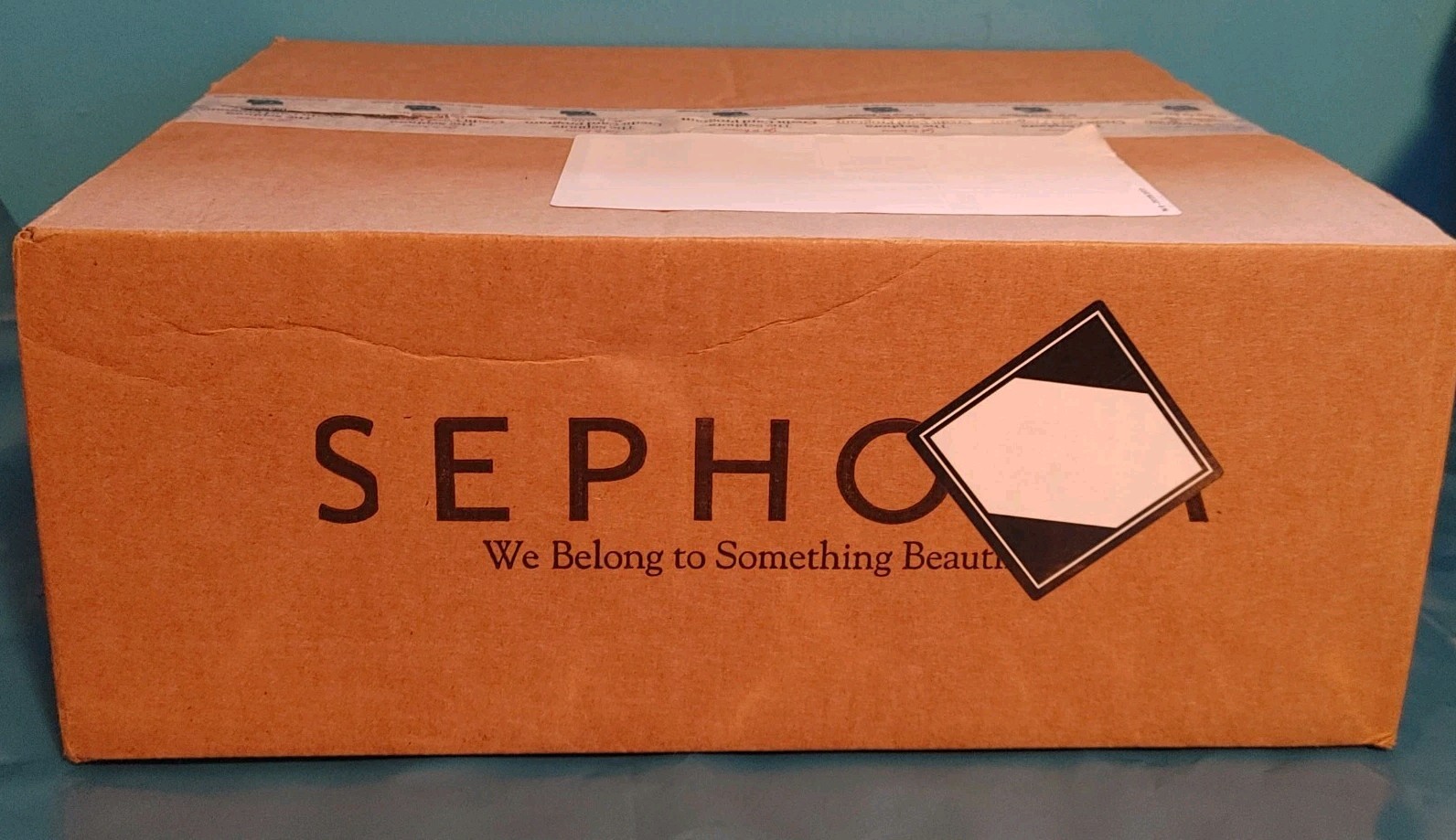 An Empty Sephora Box Possible Items Enclosed