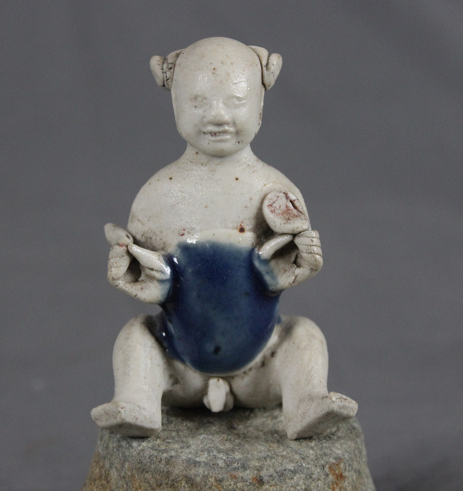 Van Halm London 18th Century Chinese Porcelain Seated Boy c1725