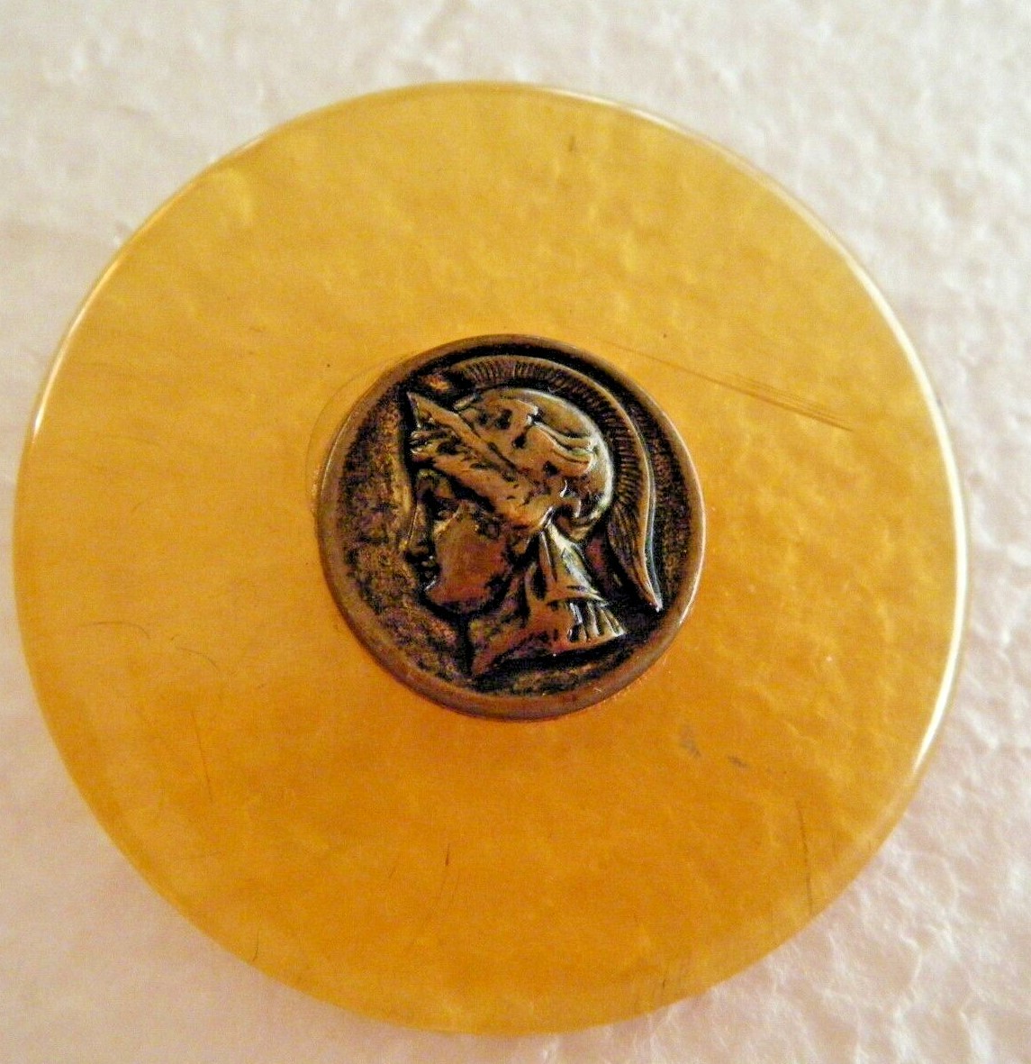Vtg picture button Apple Juice Bakelite amber color w brass button warrior 2″