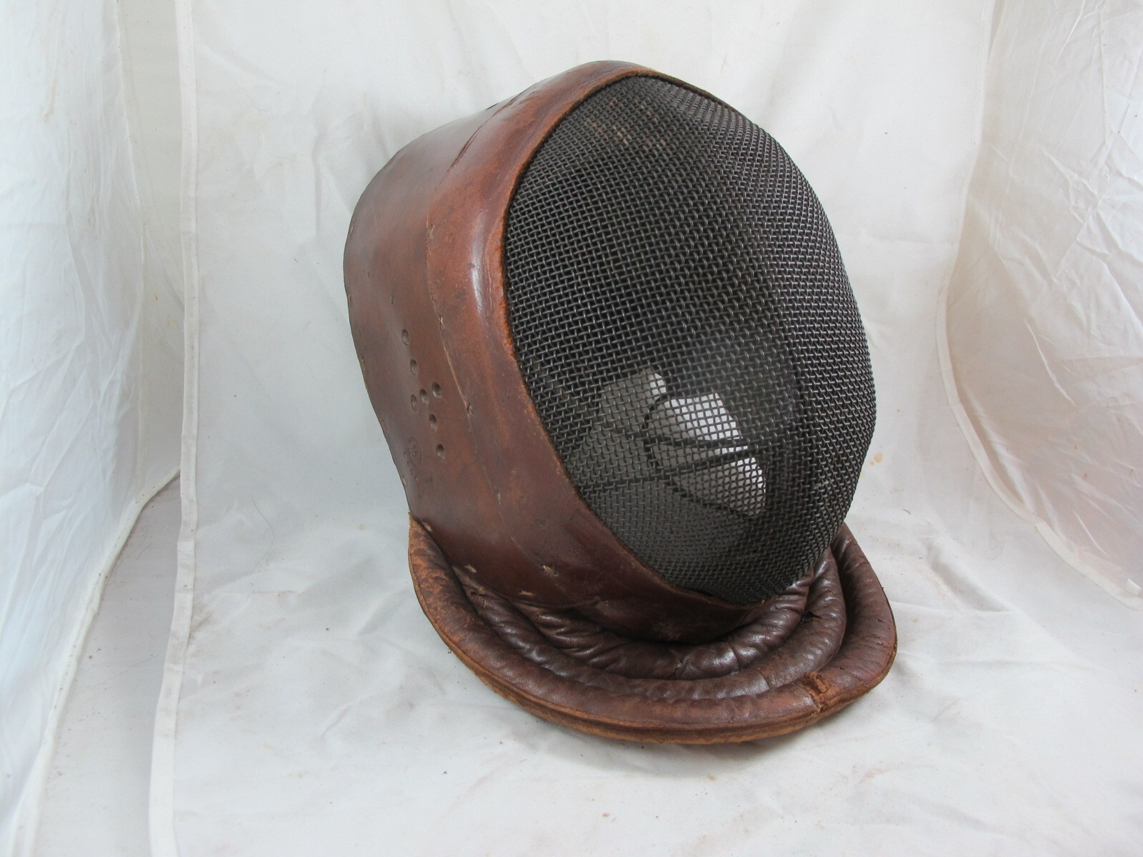 ENGLISH MADE LEATHER FENCING HELMET, BY W. M. MADDOX & CO, LONDON, BROADARROW MA