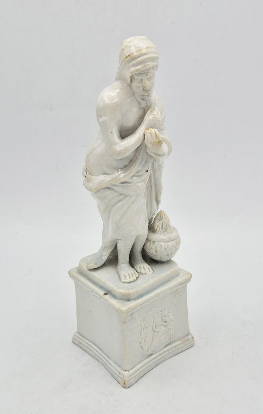 GEORGIAN STAFFORDSHIRE PEARLWARE FIGURE DEPICTING WINTER c1790