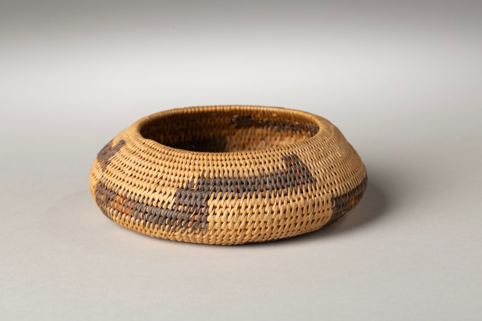 1900 Pomo Low Basket, Dark Band at Base, With Metal Tag