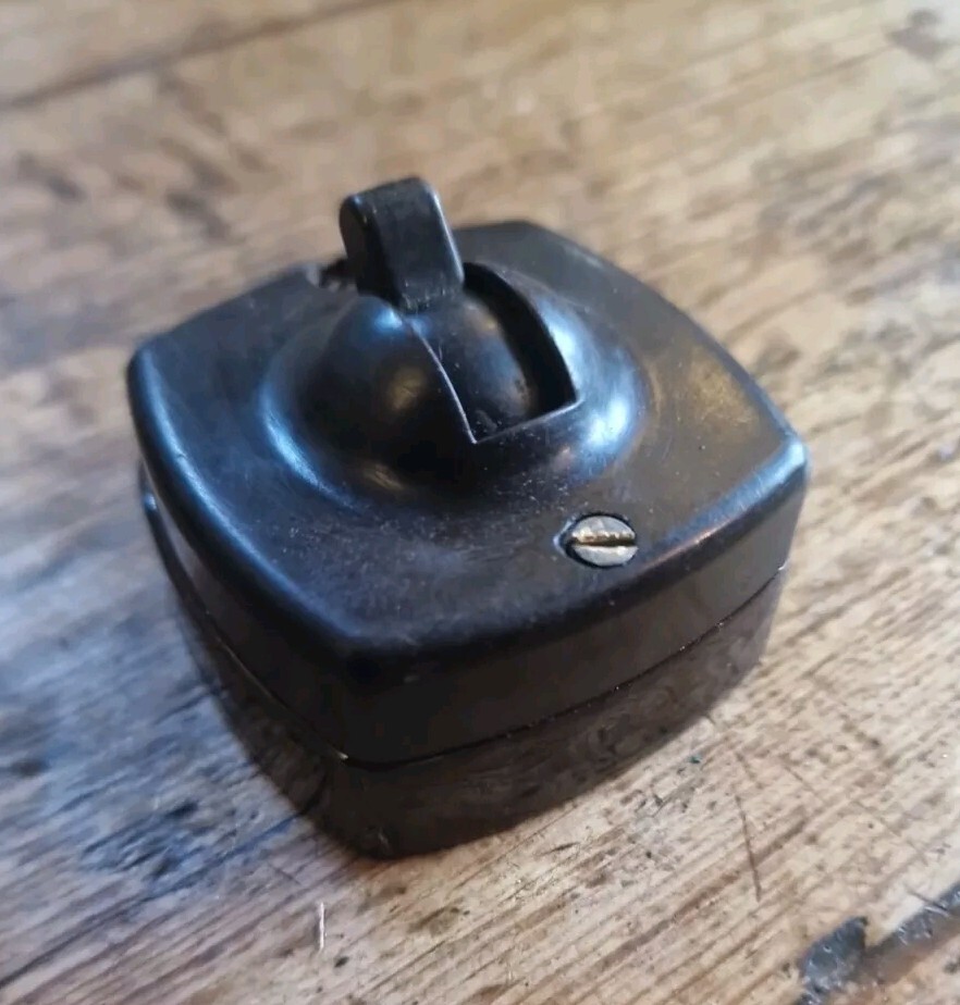 A 1930s Britmac Square Bakelite and Vitreous China Dolly Light Switch. 1 Way