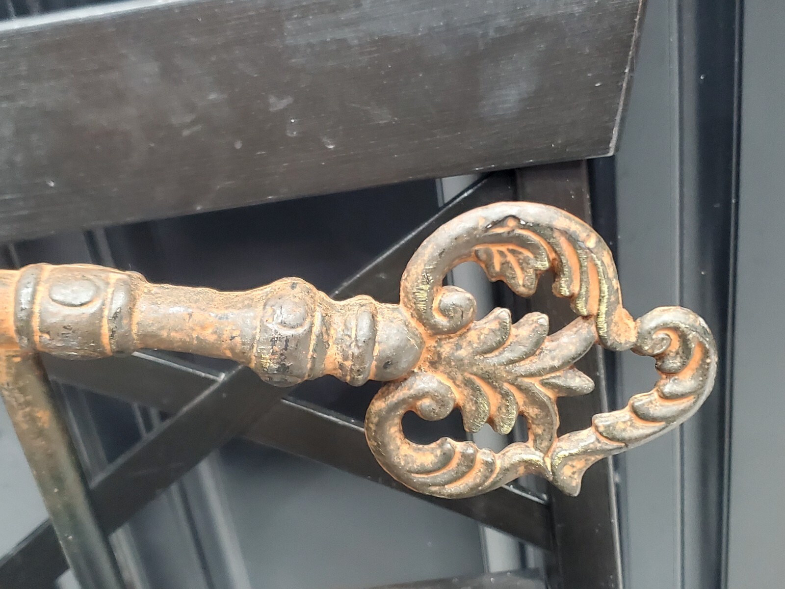 13in Antique Large solid cast iron key heavy on stand. Old church castle palace?