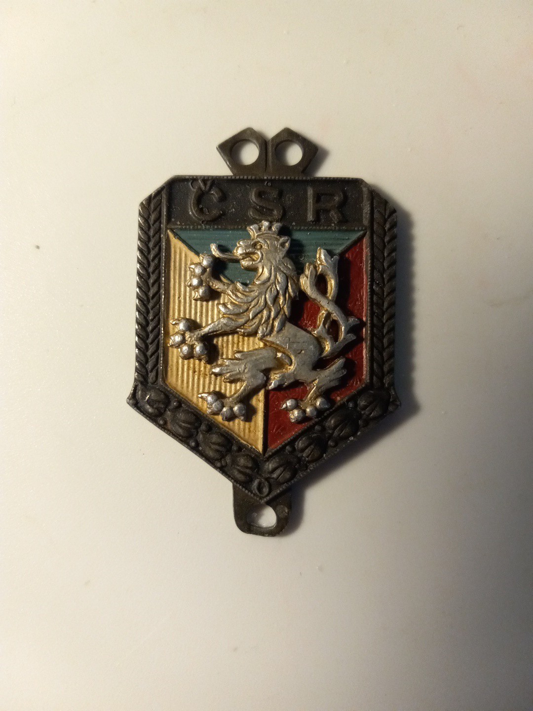 Latvian Frontier Guard badge with a lion rampant and “CSR” inscription.