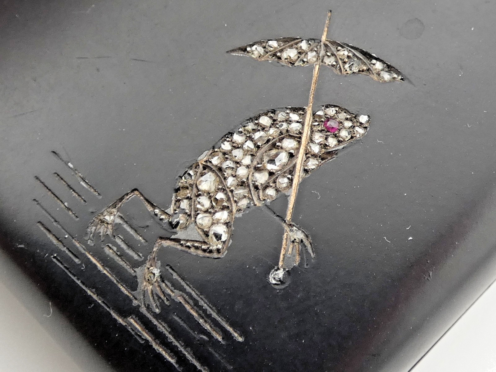 A RARE ART DECO MATT BLACK DIAMOND RUBY SAPPHIRE ENCRUSTED FROG CIGARETTE CASE