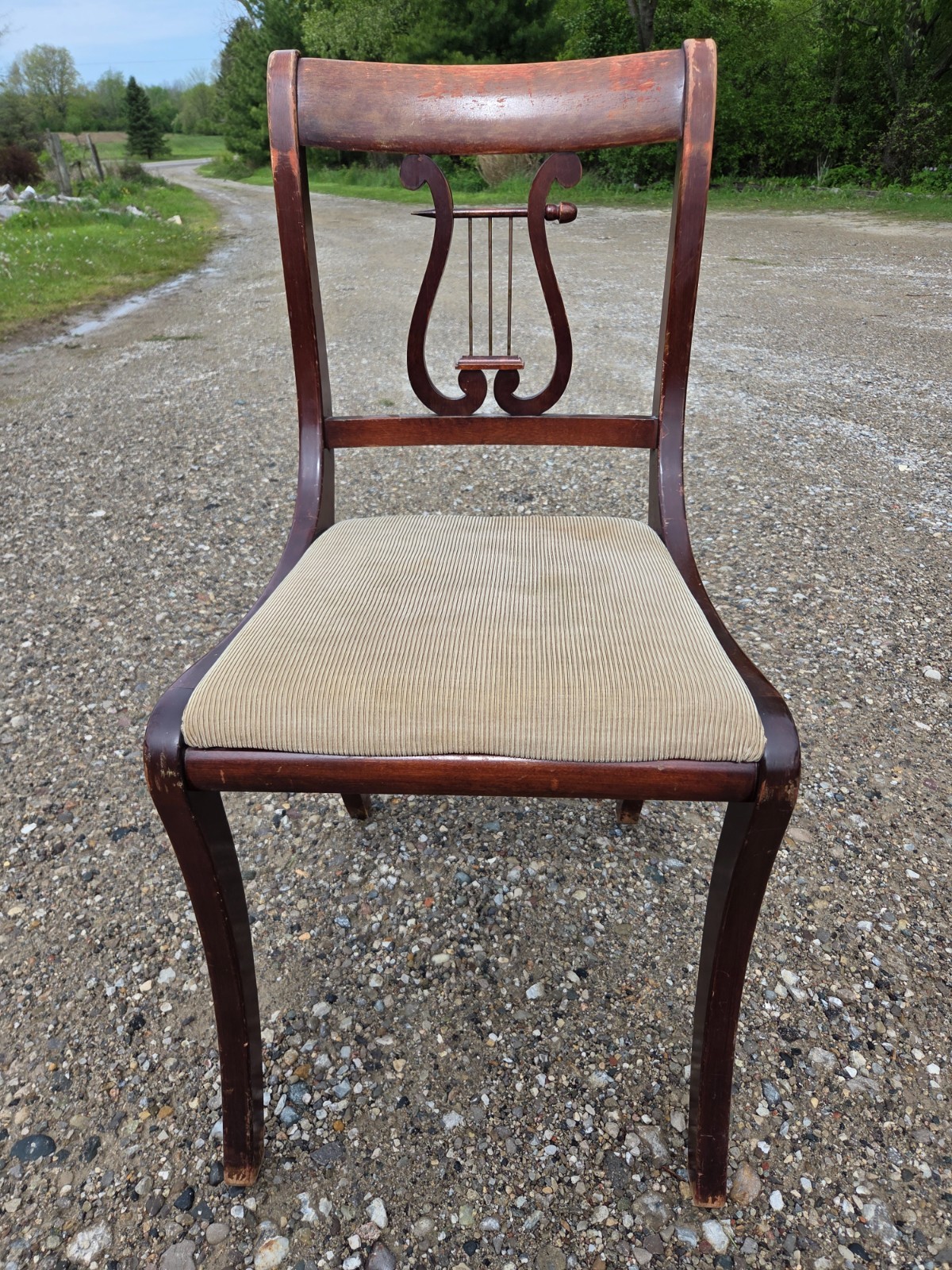 Vintage dining chair manufactured by Charlotte Chair Company in Charlotte, Mich.