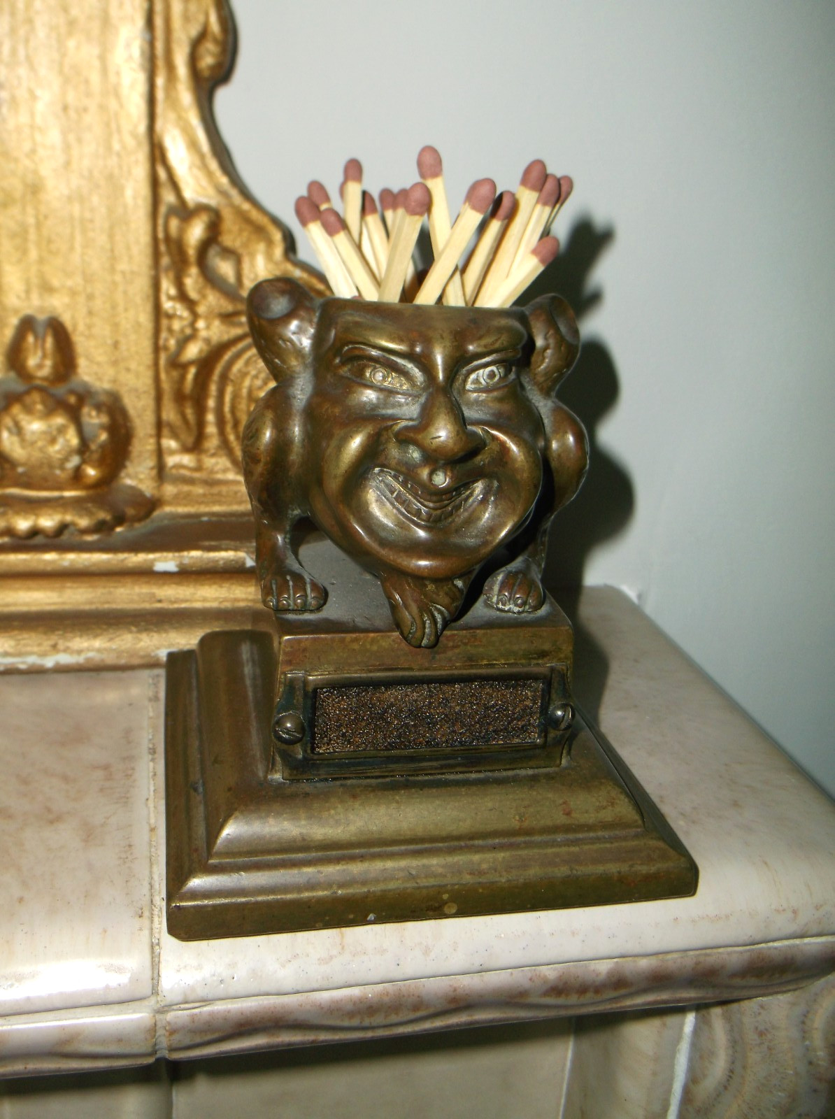 A RARE ANTIQUE GROTESQUE BRONZE MACABRE GOBLIN FIGURE MATCH HOLDER & STRIKER