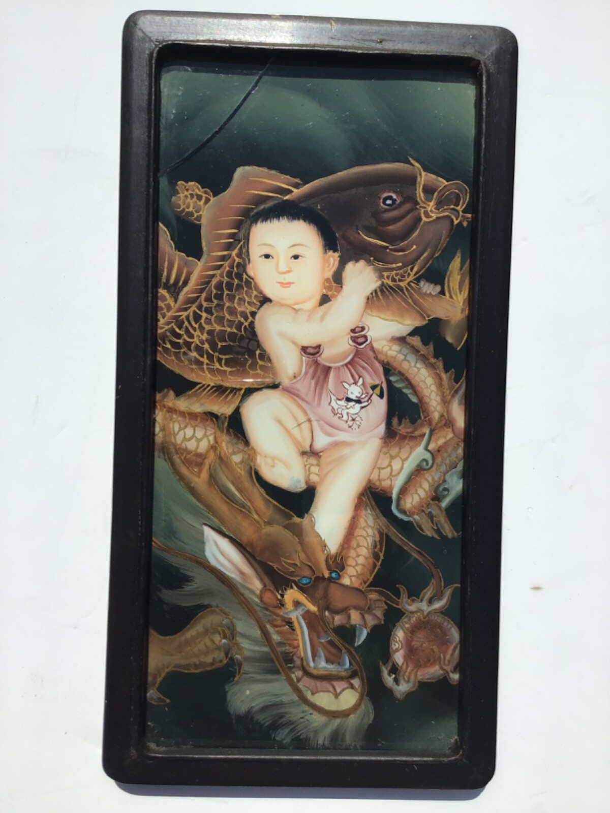 Two Antique Reverse Painted Chinese Childern Riding Dragons