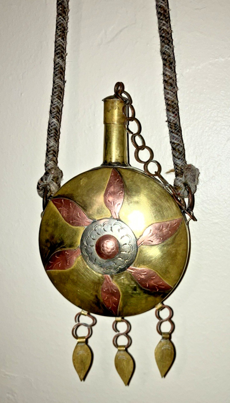 Moroccan Antique powder flask – brass, metal, and copper on handwoven cord