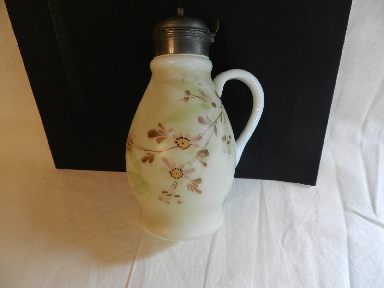 Vintage white satin milk syrup applied handle pewter lid pale green brown yellow