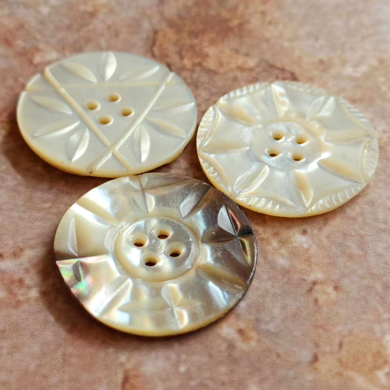 3 Antique Pearl Shell Buttons w/ Different Carved Designs ~ just over 1-3/16″