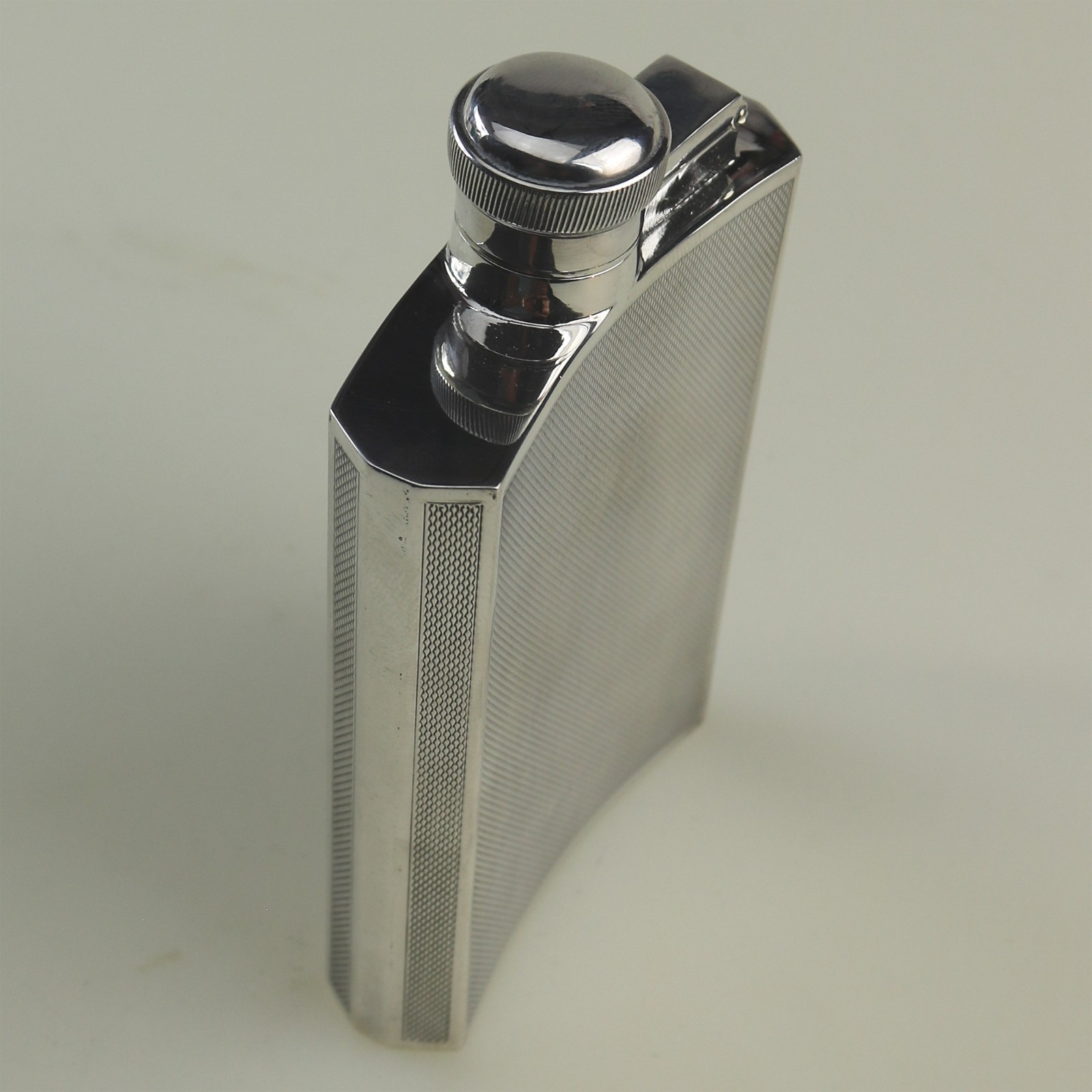 A good mid-century solid silver curved 8-panel sides Hip Flask 142g C.1955