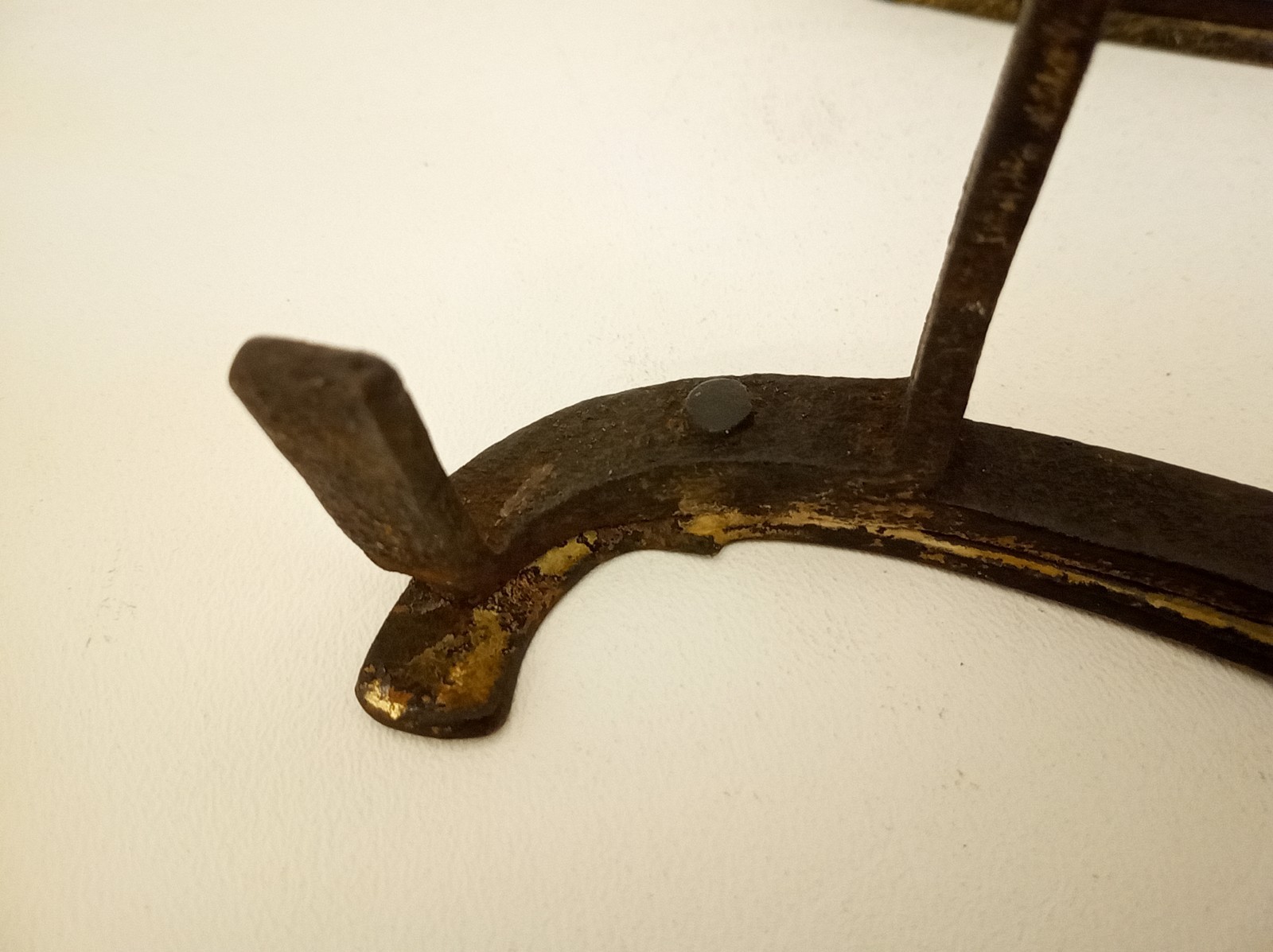 Antique primitive wrought iron standing trivet brass top Pennyslvania Dutch