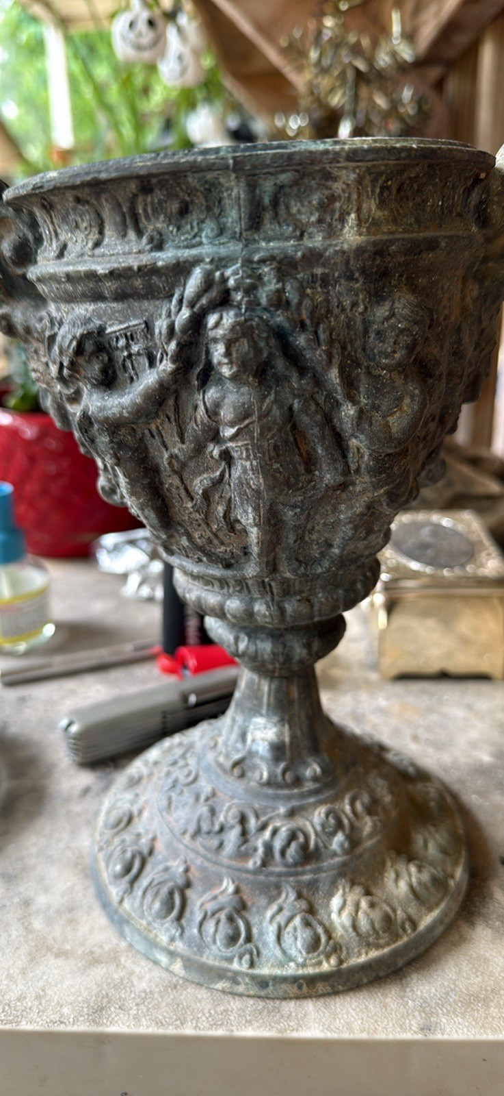 Bronze Neo-classical Style Urn/Chalice with Cherub or putti reliefs.