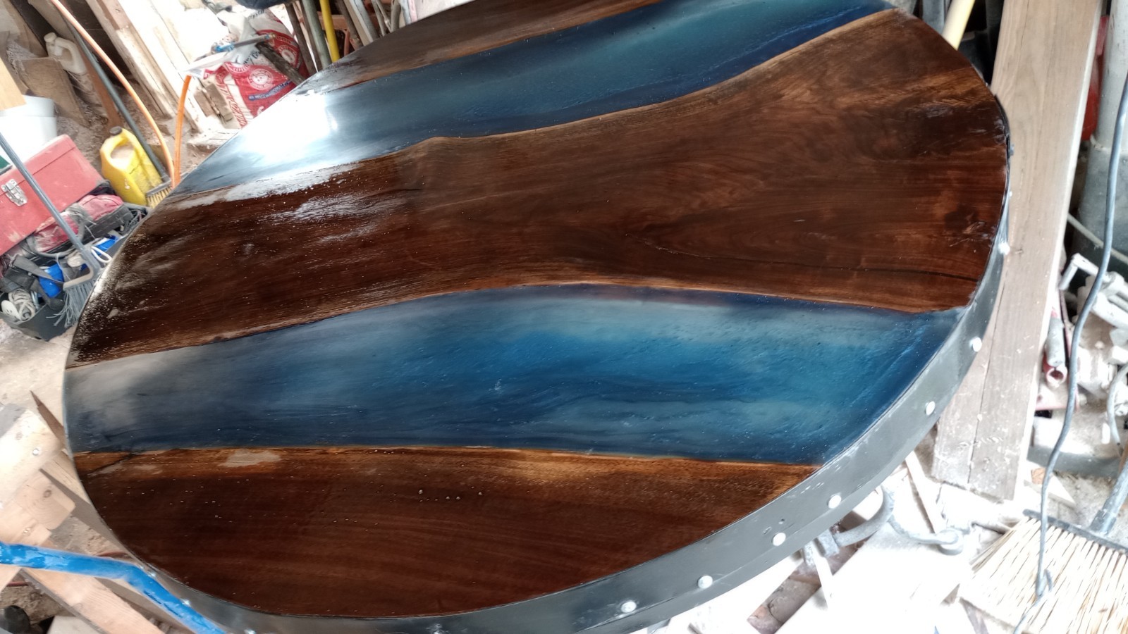 Two Rivers. Walnut And Resin Table Top And Cast Iron Base