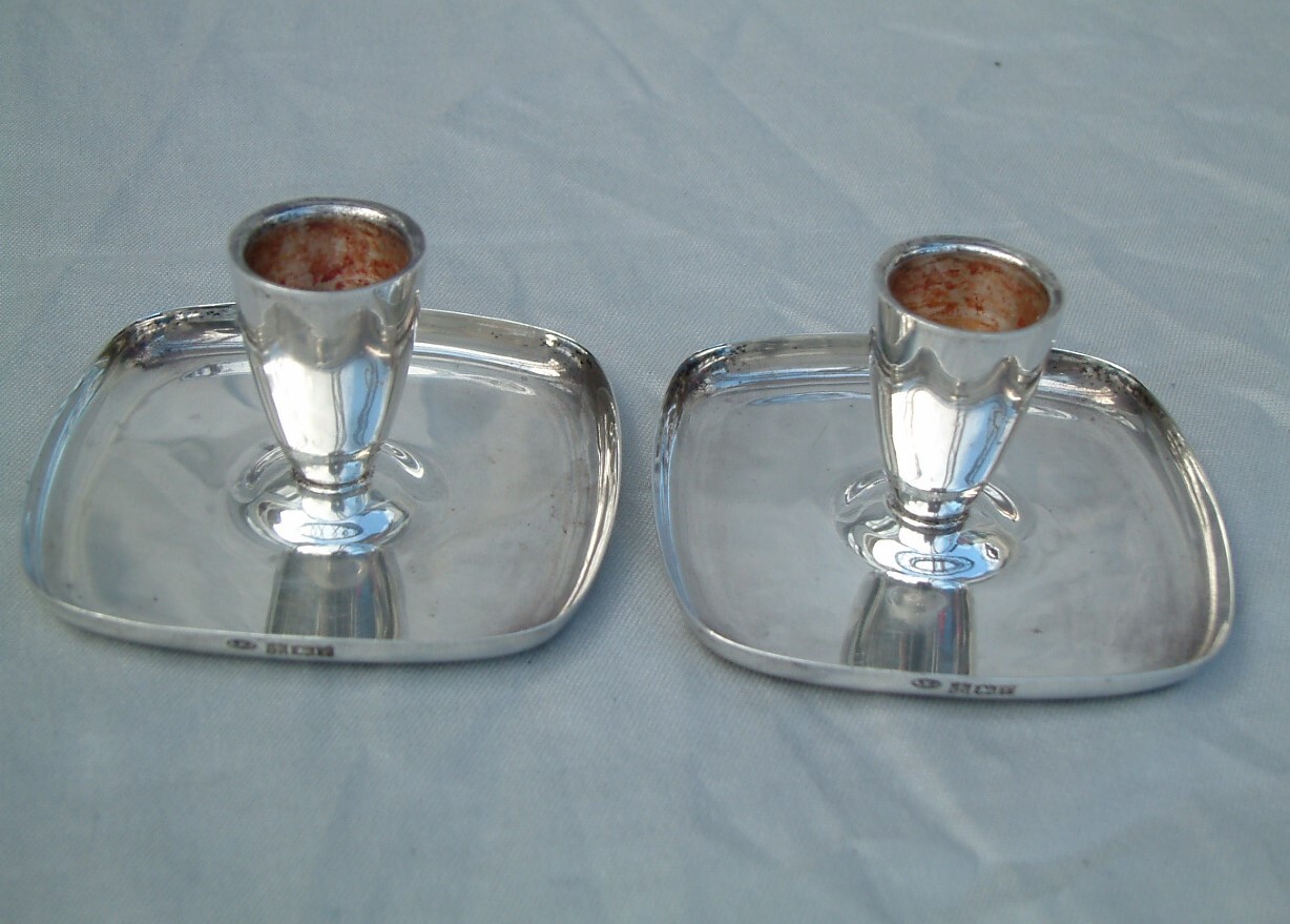 A.E. Jones Pair of Sterling Silver Candlesticks. Birmingham 1973