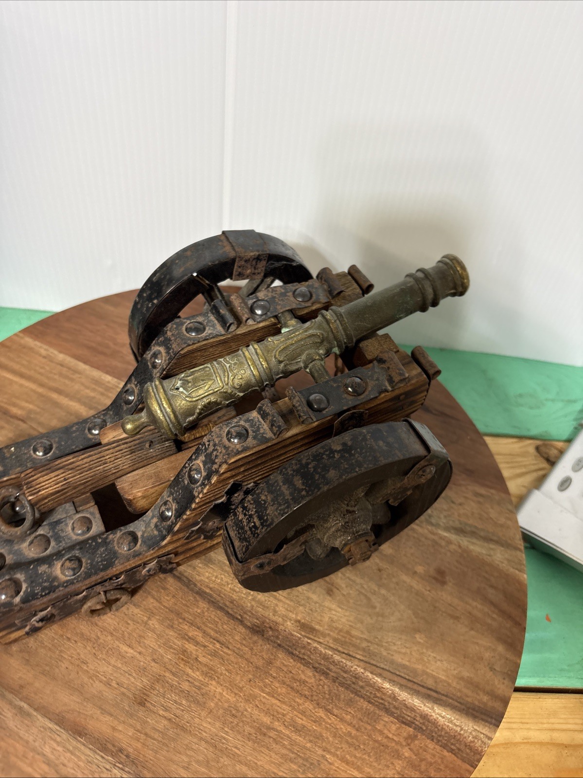 Vintage Spanish cannon replica wood base and copper cannon and steel studs
