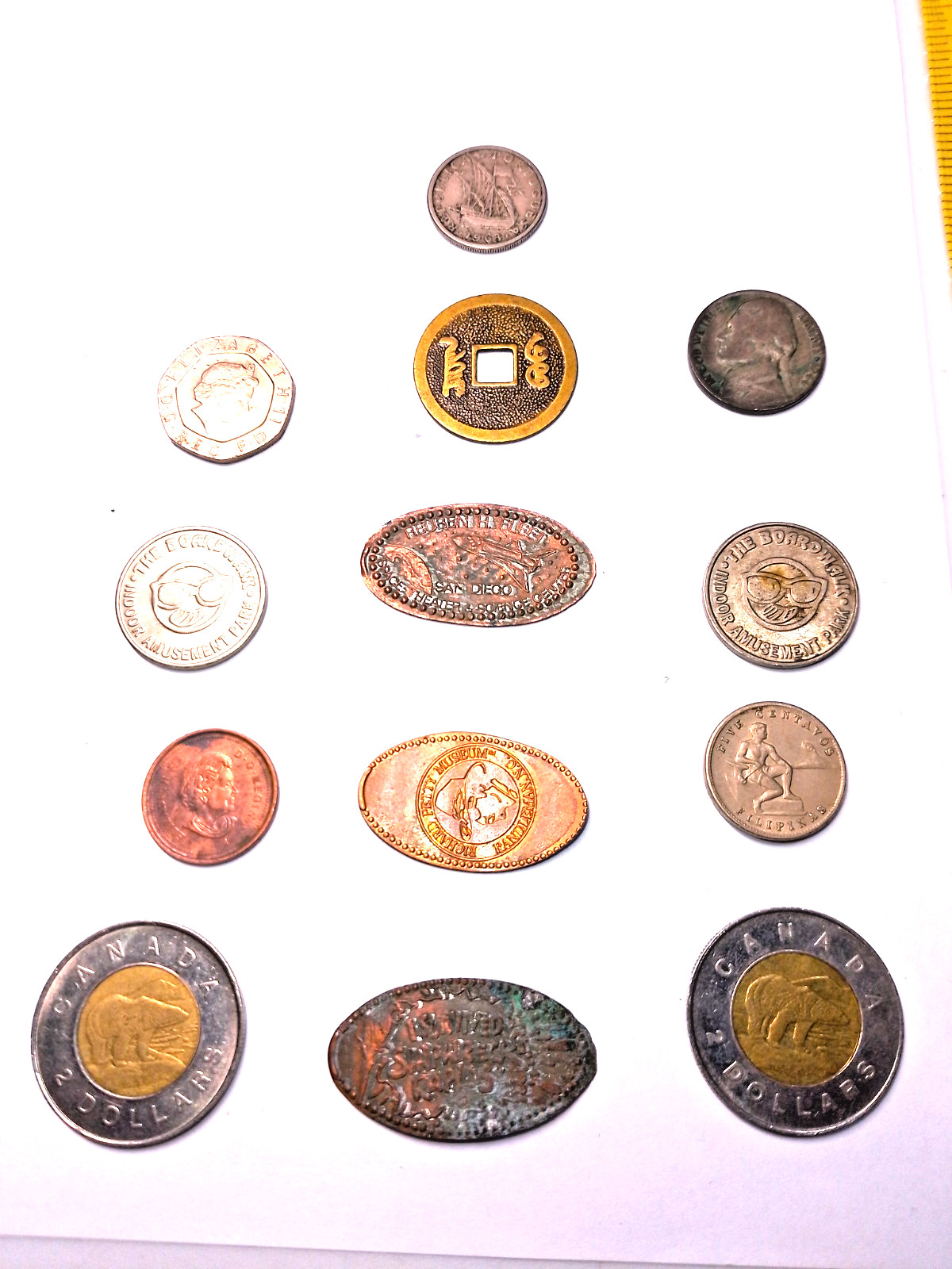 Assorted lot coins stretch pennies tokens as seen