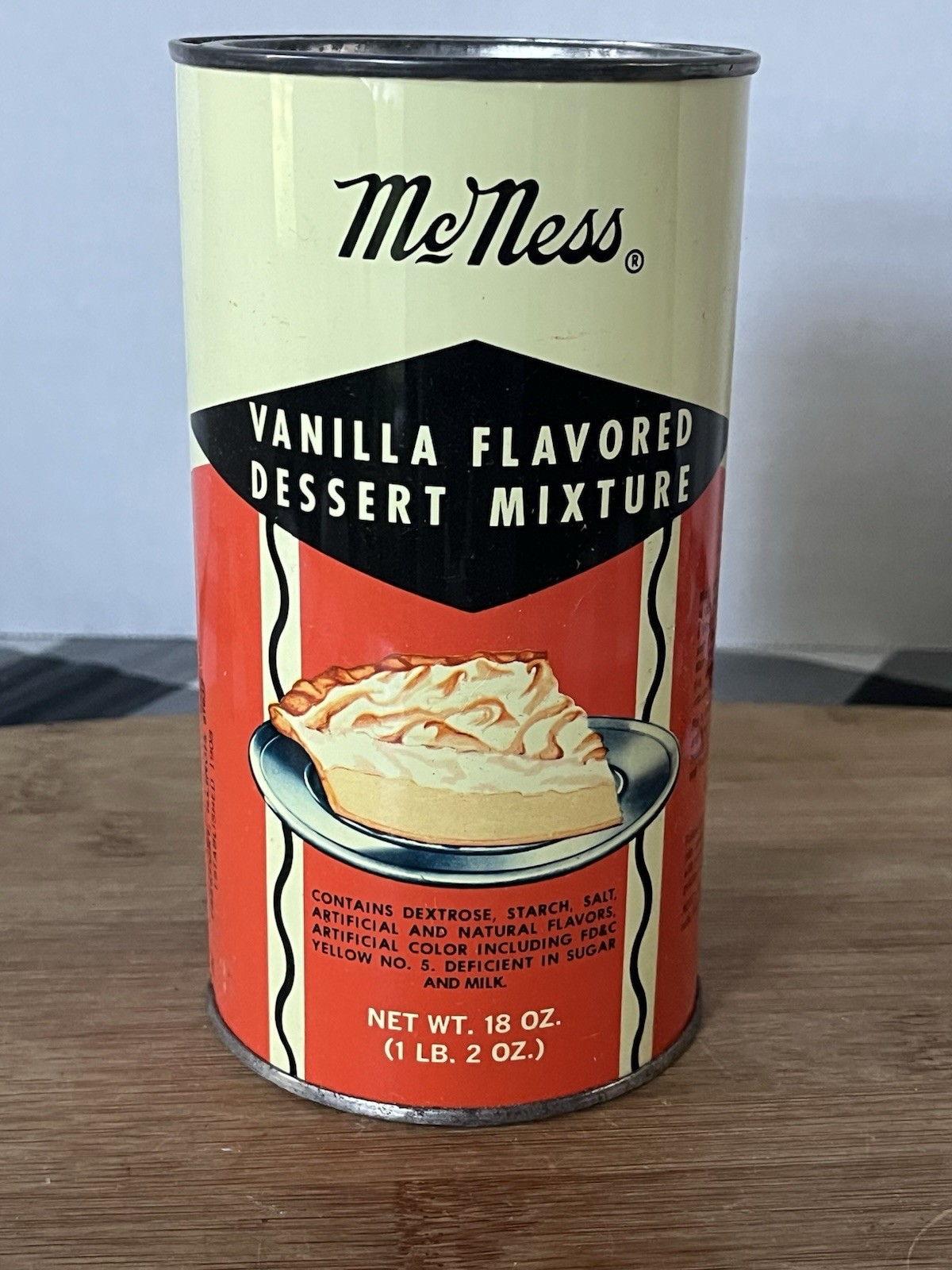 VINTAGE McNESS VANILLA FLAVORED DESERT MIX TIN CAN 18 OZ 6″ HIGH X 3.25″ WIDE