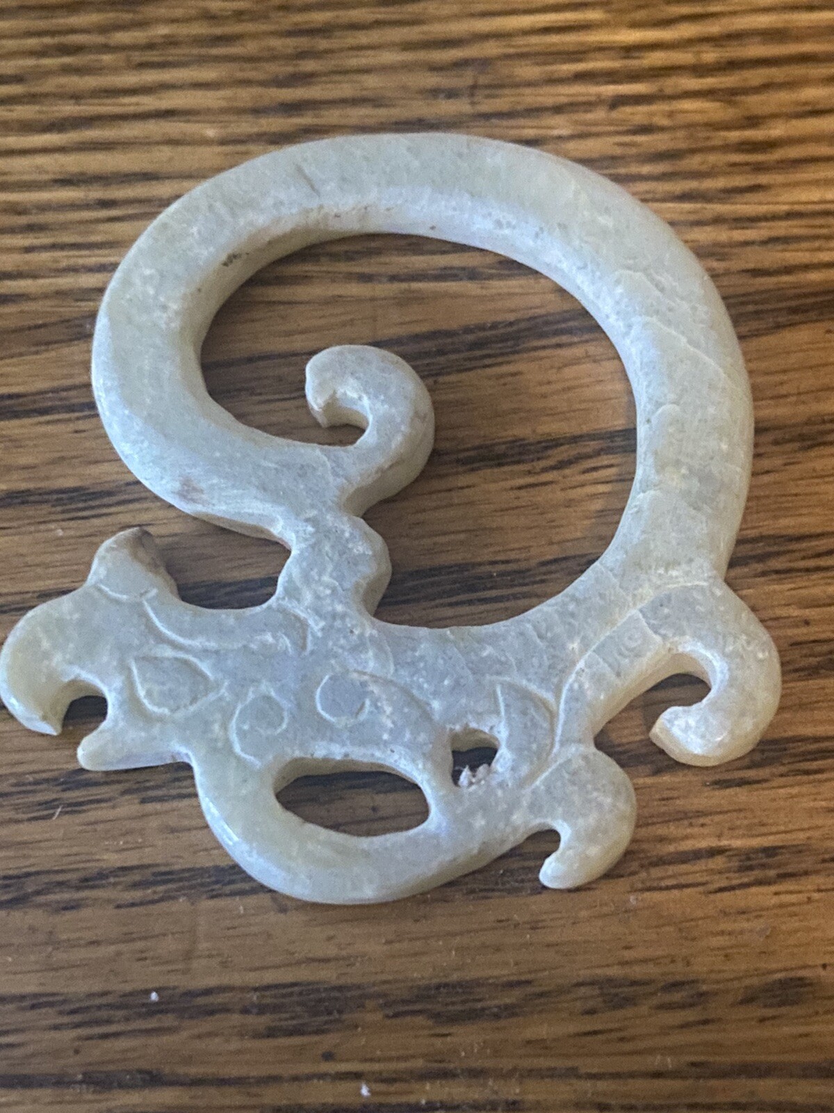 RARE FIND OF THINLY SLICED WHITE JADE CARVING OF A DRAGON,SHANG , 1600-1046 BC.