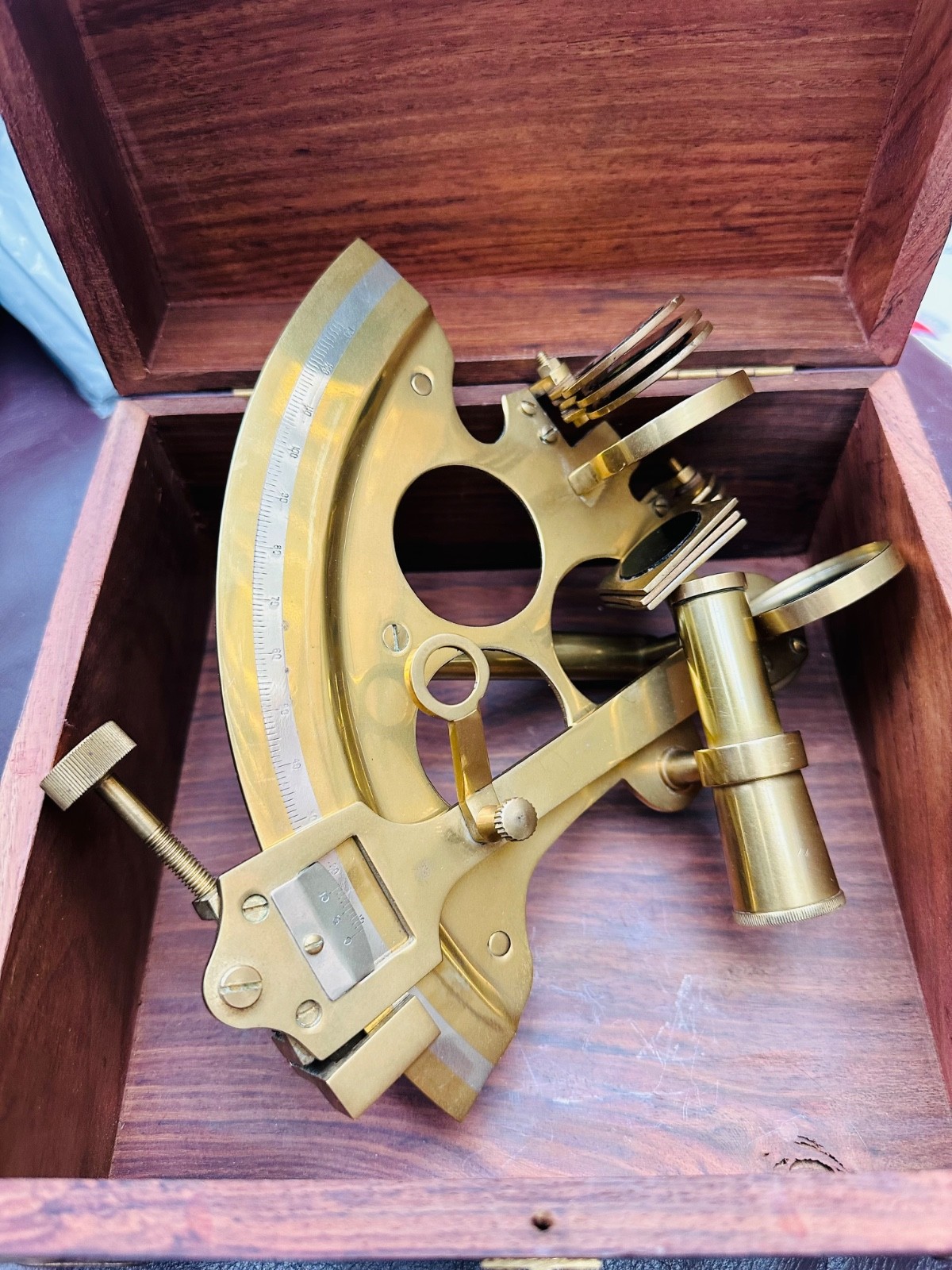 Vintage brass nautical sextant and brown wood box gold accents